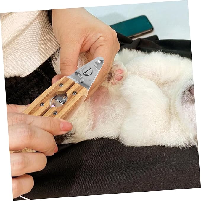 Pet Nail Clipper for Dogs and Cats Compact Stainless Steel Toenail Trimmer with Safety Guard for Small Animals Easy and Convenient Grooming Tool for Home Use