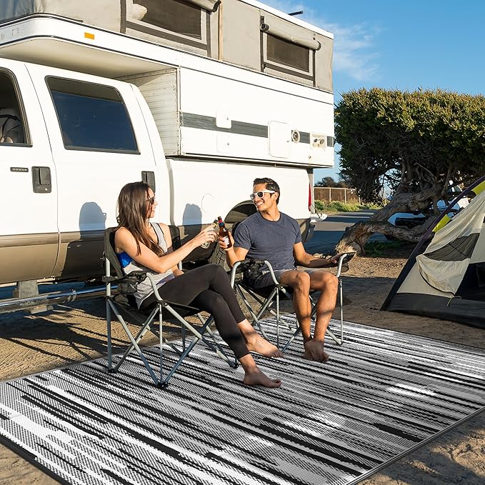 GENIMO Outdoor Rug for Patio Clearance, 6'x9' Waterproof Camping Mat, Reversible Plastic Straw Rugs for RV, Camper, Balcony, Backyard, Picnic, Deck (Black White)